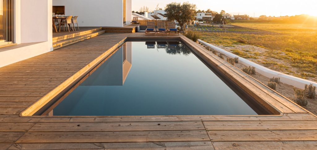 semi inground pool with wooden deck melbourne fl